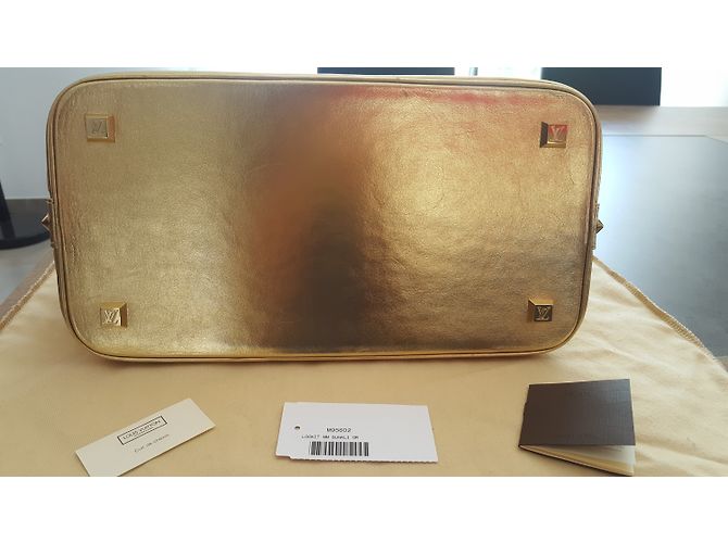 Louis Vuitton Lockit MM Suhali Borsa a mano in pelle di capra oro metallizzato D'oro Metallico - vista 8