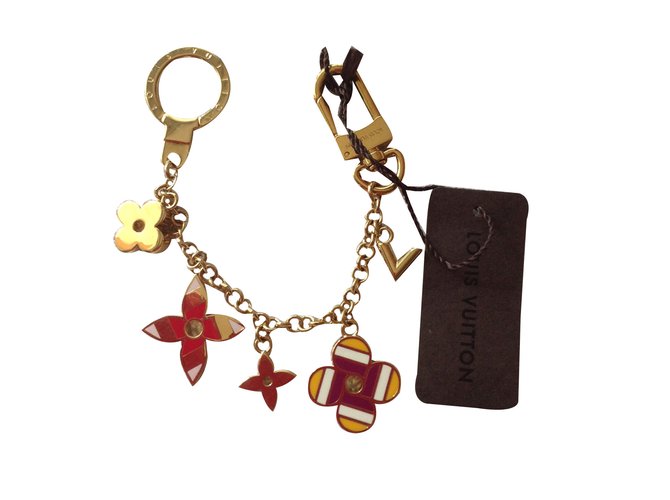 Louis Vuitton Bag charms Golden Metal ref.75333 Joli Closet