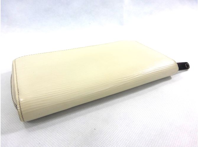 Louis Vuitton Billetera Zippy Cuero Crema - vista 3