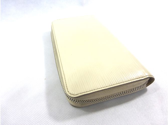 Louis Vuitton Billetera Zippy Cuero Crema - vista 5