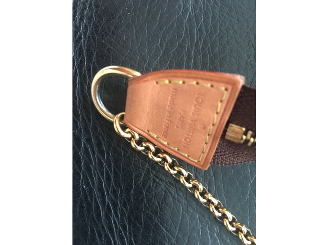 Louis Vuitton POCHETTE EVA - vista 4