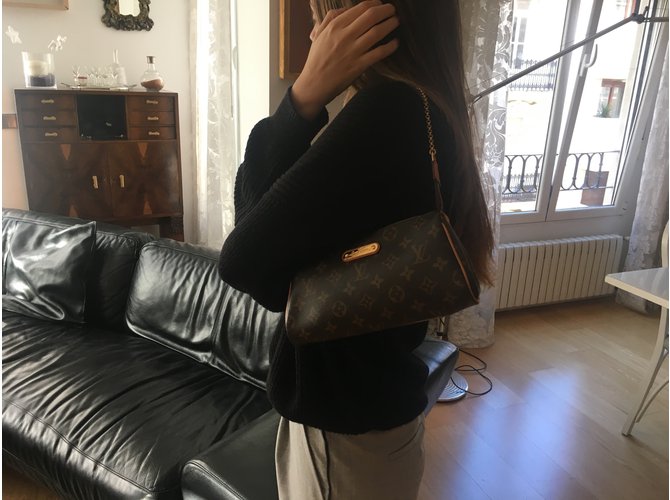 Louis Vuitton POCHETTE EVA - vista 8