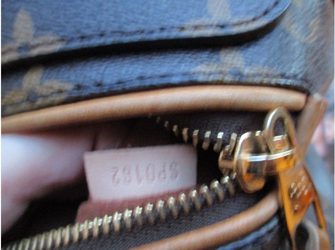 Louis Vuitton Olympe en lona mono y cuero bronceado. Castaño - vista 7