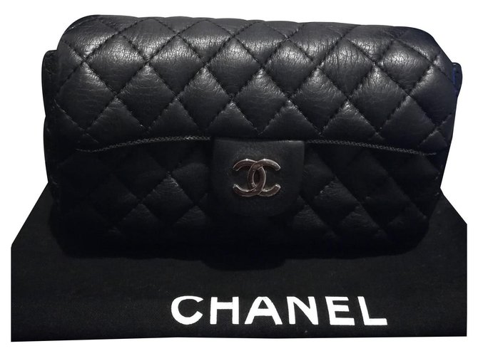 Chanel Clutch bags Black Leather ref.132467 - Joli Closet