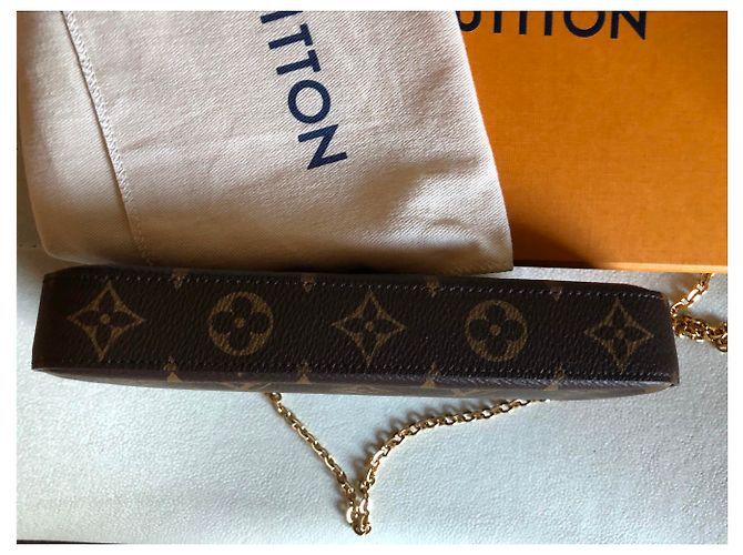 Louis Vuitton Clutch Felicie Marrone - vista 4