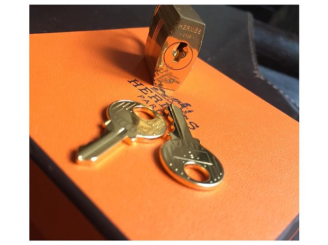 Hermès goldenes Vorhängeschloss für Birkin oder Kelly Handtasche Neu - Ansicht 3
