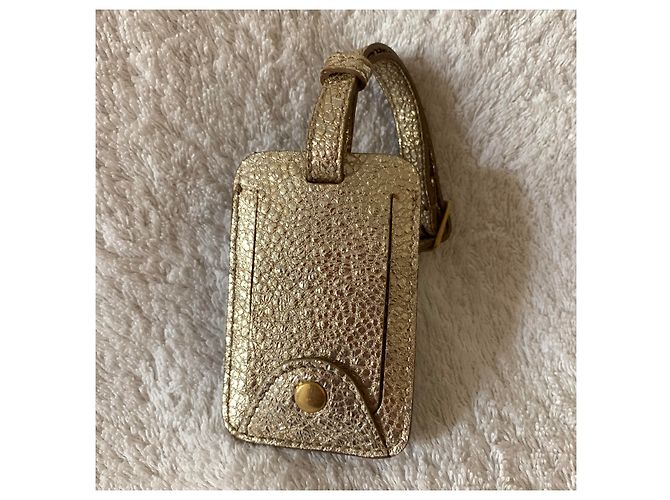 Yves Saint Laurent Etiqueta de viaje de cuero dorado - vista 2