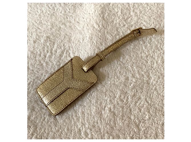 Yves Saint Laurent Etiqueta de viaje de cuero dorado - vista 3