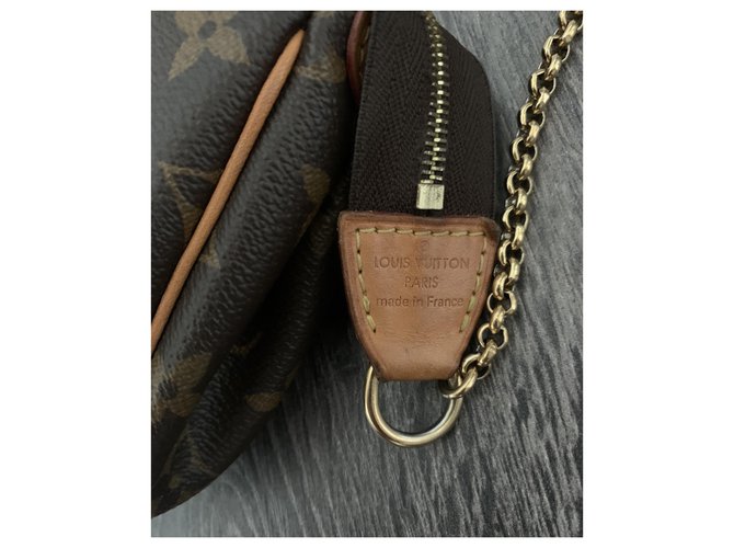 Louis Vuitton Pochette Eva Marrone - vista 3
