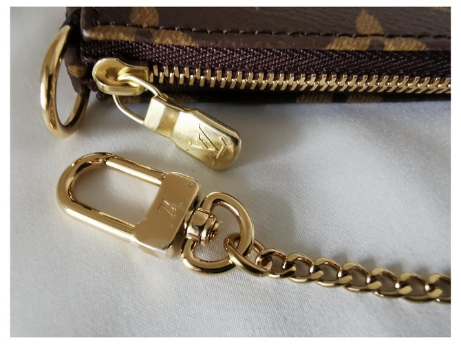 Louis Vuitton Mini custodia per accessori con monogramma Gold hardware - vista 13