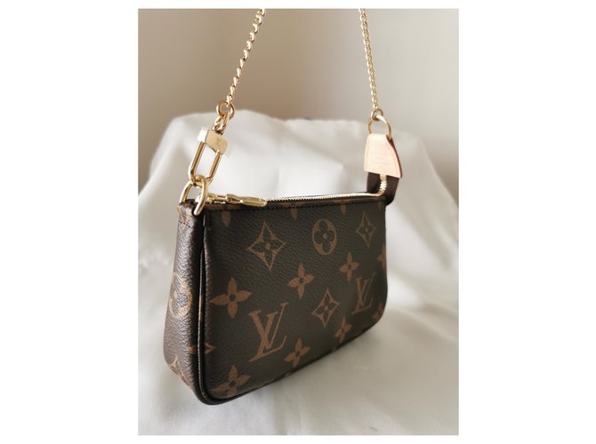 Louis Vuitton Mini custodia per accessori con monogramma Gold hardware - vista 8