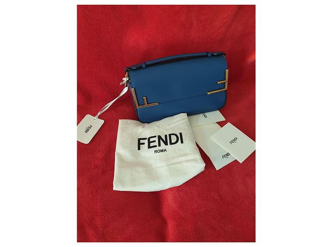 FENDI - Borsa a tracolla FF Baguette foderata in pelle - Logo marrone / pelle blu - vista 4