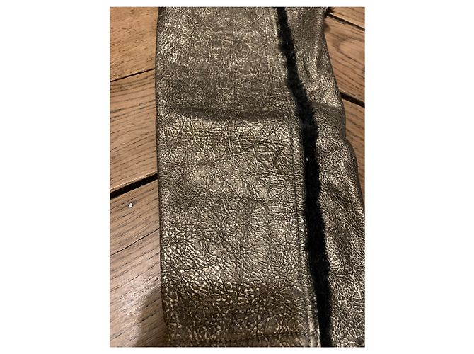 Stivali Chanel in pelle oro e nero D'oro - vista 2