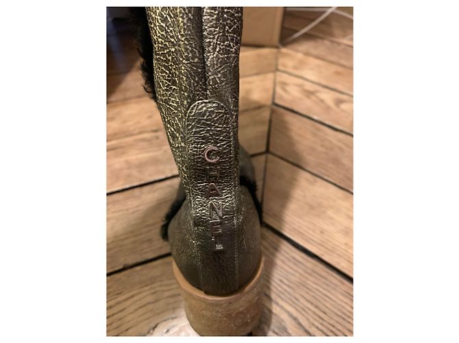 Stivali Chanel in pelle oro e nero D'oro - vista 4