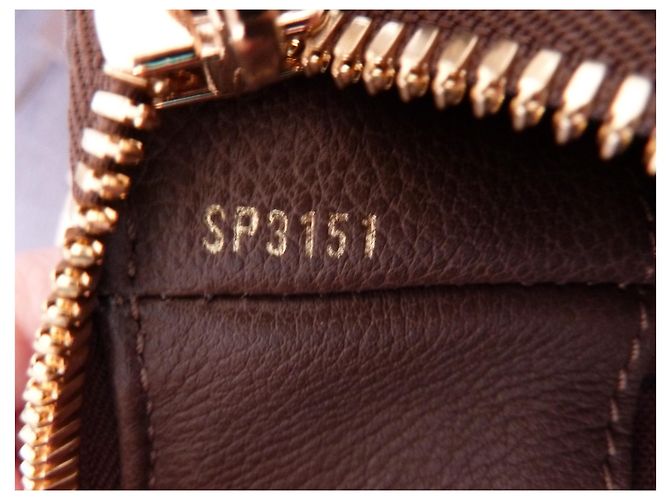 LOUIS VUITTON Audacieuse GM Empreinte borsa Marrone scuro - vista 9