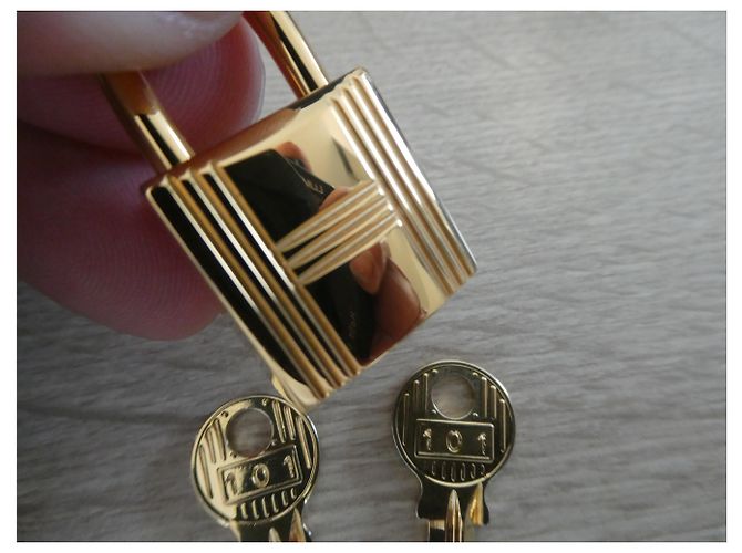 Lucchetto Hermès in acciaio dorato con chiavi Gold hardware - vista 3
