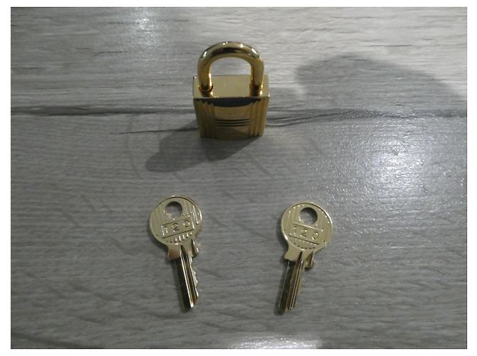 Lucchetto Hermès in acciaio dorato con 2 chiavi Gold hardware - vista 2