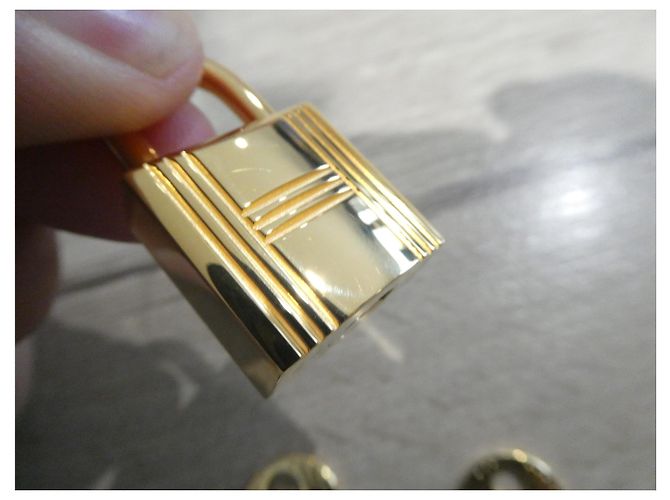 Lucchetto Hermès in acciaio dorato con 2 chiavi Gold hardware - vista 4