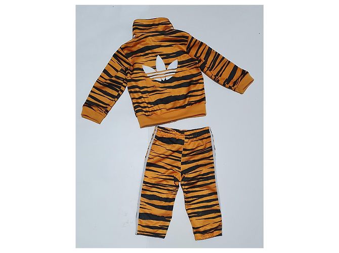 Completo Adidas giacca e pantaloni stampa zebra giallo nero Multicolore - vista 3