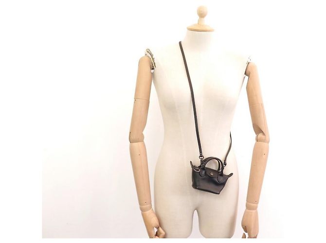 NUOVA MINI BORSA A MANO LONGCHAMP LE PLIAGE ATTRAVERSO XS BANDOULIERE IN PELLE NERA - vista 4