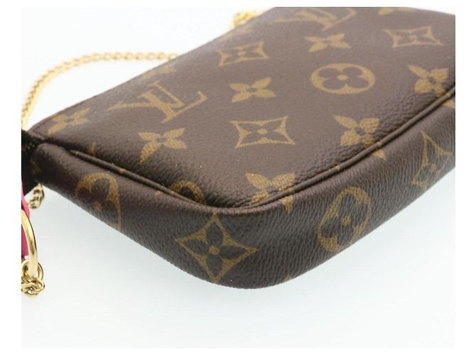 LOUIS VUITTON Monogram Vivienne Mini Pochette Accessoires M68490 auth 27893 - vue 16