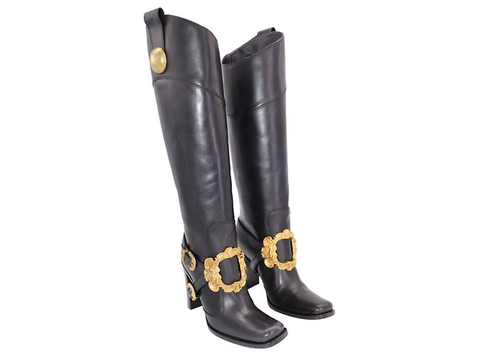 Botas de cano alto Dolce & Gabbana com detalhe de fivela dourada em couro preto - vista 4