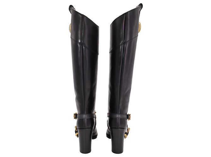 Botas de cano alto Dolce & Gabbana com detalhe de fivela dourada em couro preto - vista 5