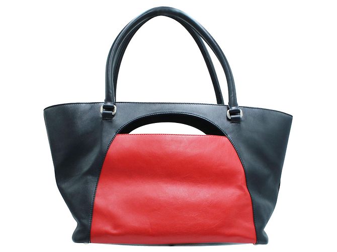 JW Anderson Borsa a mano in pelle blu navy e rossa - vista 3