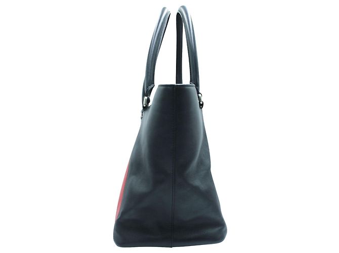 JW Anderson Borsa a mano in pelle blu navy e rossa - vista 4