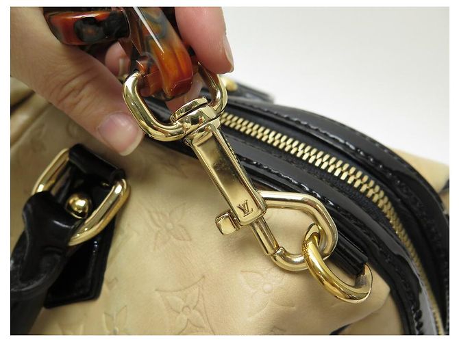 LOUIS VUITTON STEPHEN SPROUSE BOSTON BORSA A MANO MONOGRAM IN PELLE EMPREINTE Beige - vista 7