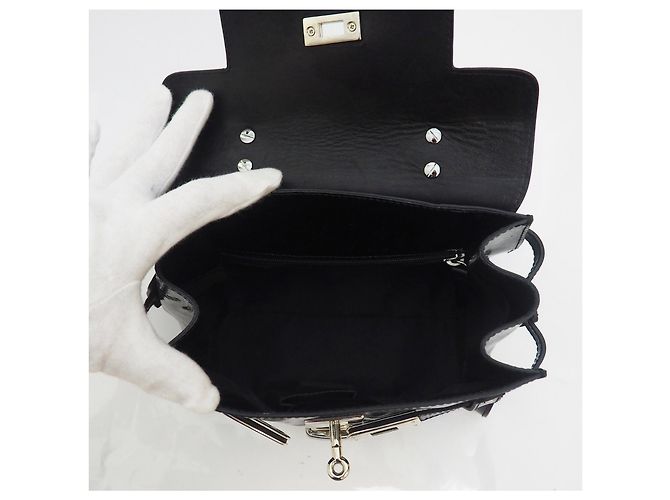 Minibolso negro de charol de Russell & Bromley - vista 10