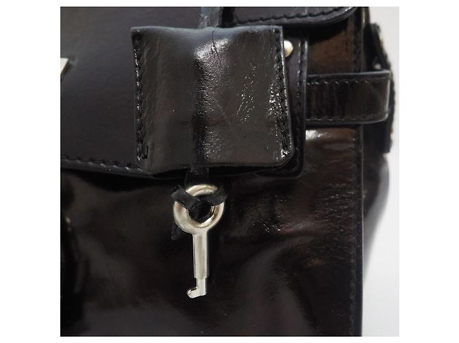 Minibolso negro de charol de Russell & Bromley - vista 11