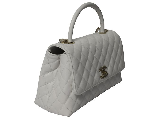 Bolsa Chanel Diamond acolchoada com alça superior em couro caviar branco - vista 2