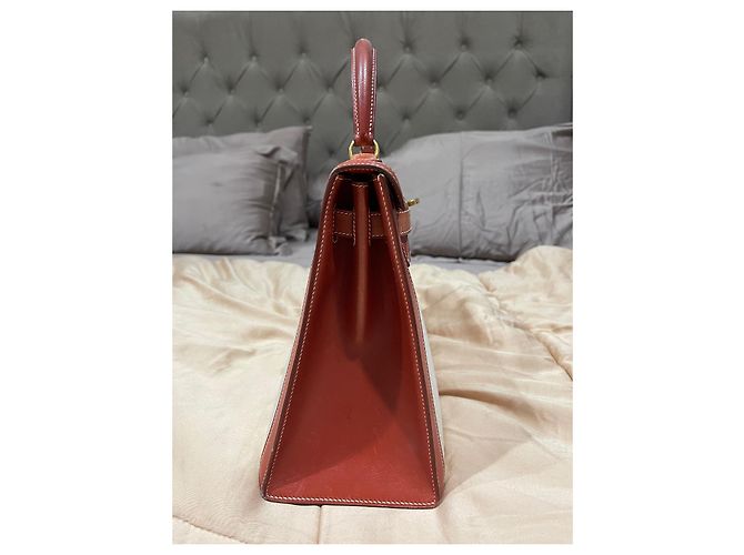 Hermès Kelly Bordeaux in pelle Box con finiture oro Marrone Castagno - view 4