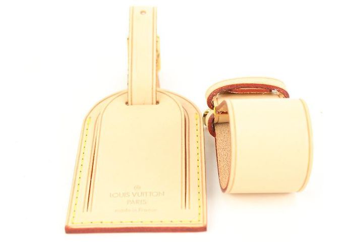 Louis Vuitton Etiquette de bagage en cuir de vachette et bijou de sac Poignet Keepall - vue 9