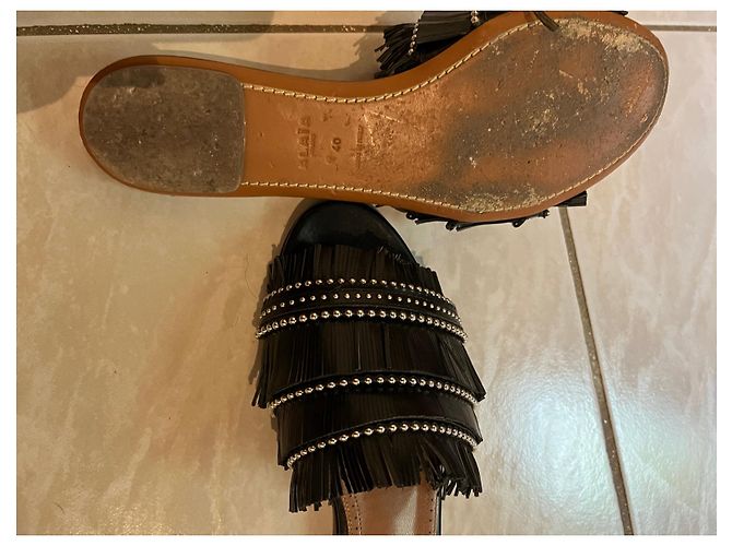 Mules Alaïa con frange in pelle nera Nero - vista 3