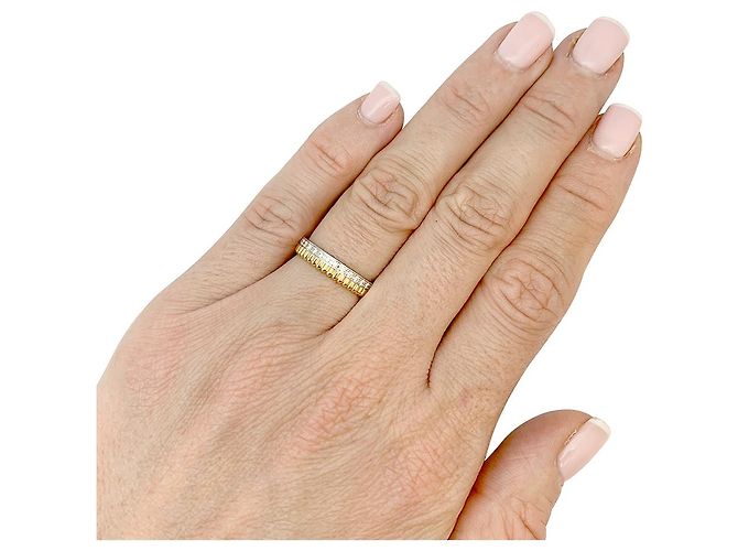 Anello di Boucheron, “Quattro Radiant Edition Grosgrain”, due ori e diamanti. - vista 7
