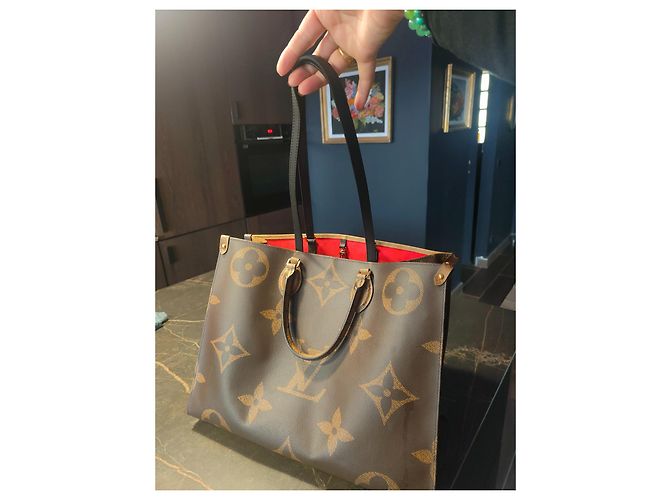 Louis Vuitton Onthego GM Monogram Empreinte Giant Pelle Marrone - vista 7