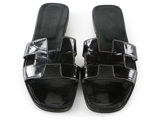 Hermès Hermes Schwarzes Lackleder Oran Flat Slides - vista 7