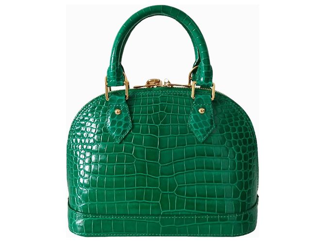 Louis Vuitton Alma BB in emerald green crocodile Exotic leather