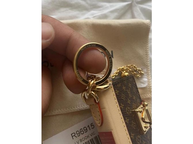 Louis Vuitton Portachiavi libro Lv Beige - vista 5