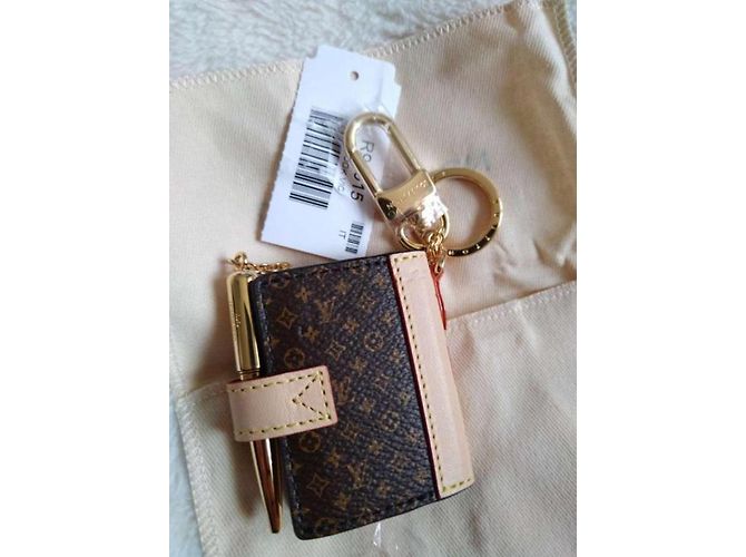 Louis Vuitton Portachiavi libro Lv Beige - vista 8
