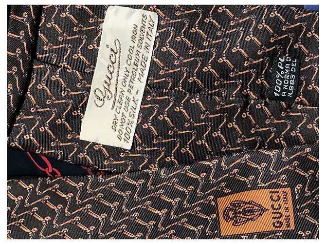 Cravatta Gucci in seta marrone con stampe - vista 5