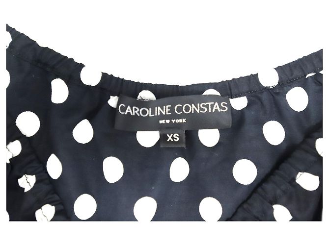 Autre Marque Camicetta con scollo a V a pois di Caroline Constas in cotone bianco e nero - vista 7