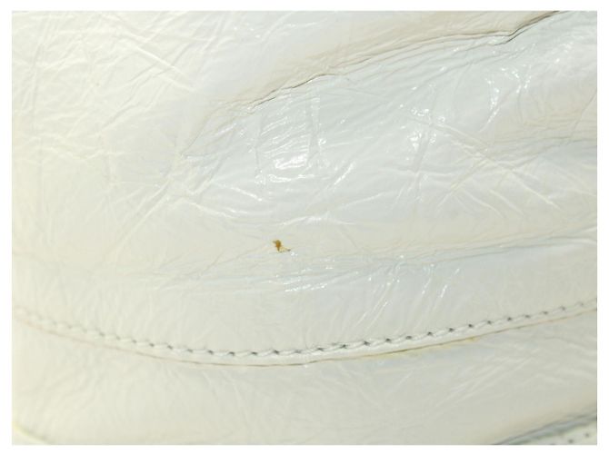 Chanel Interlocking CC Botas acolchoadas amassadas de cano médio em couro de bezerro branco - vista 7