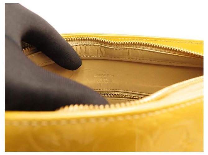 Louis Vuitton Houston in vernice dorata/jaune Beige D'oro Giallo - vista 17