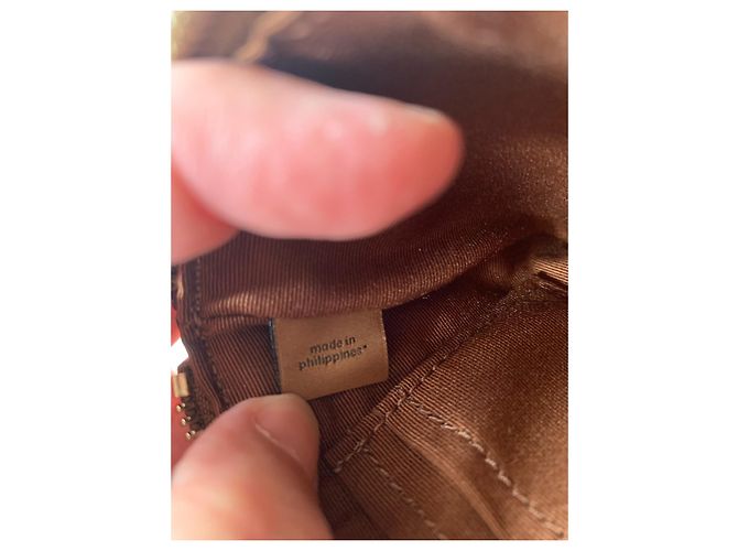 Clutch Coach em couro caramelo - vista 8