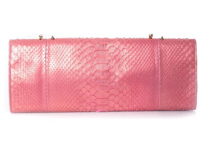 Autre Marque Maison Du Posh, Pochette con teschio piercing in pitone rosa. - vista 3