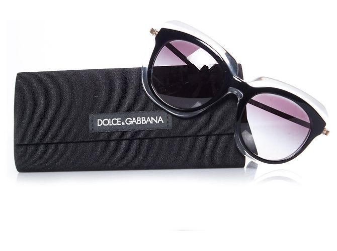 DOLCE & GABBANA, Nero oversize su occhiali da sole trasparenti. - vista 6