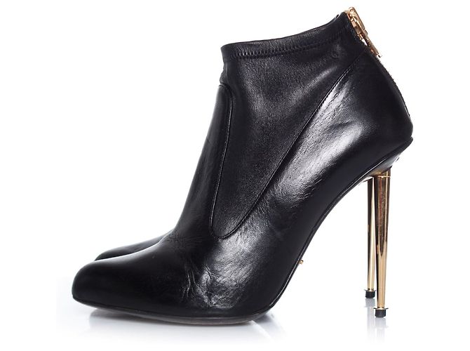 Stivaletti con stiletto Tom Ford in oro nero. - vista 2